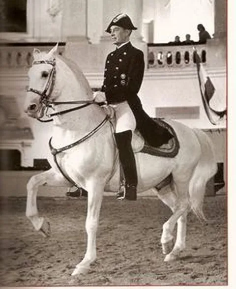 Archival photograph of Alois Podhajsky riding a Lipizzaner at the Spanish Riding School