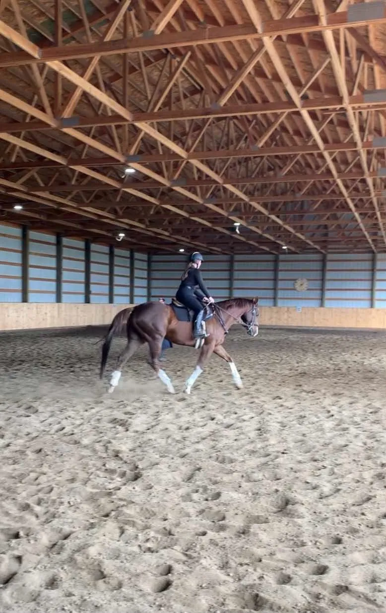Morgan Stephans, a student of Tressa Boulden, with a horse