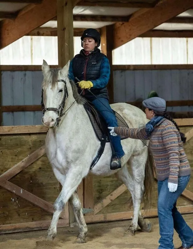 Amy Skinner, a student of Tressa Boulden, with a horse