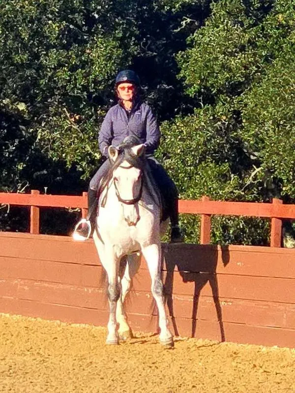 Anne Adair, a student of Tressa Boulden, with a horse