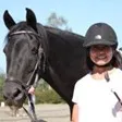 Iris Rogers, a student of Tressa Boulden, with a horse